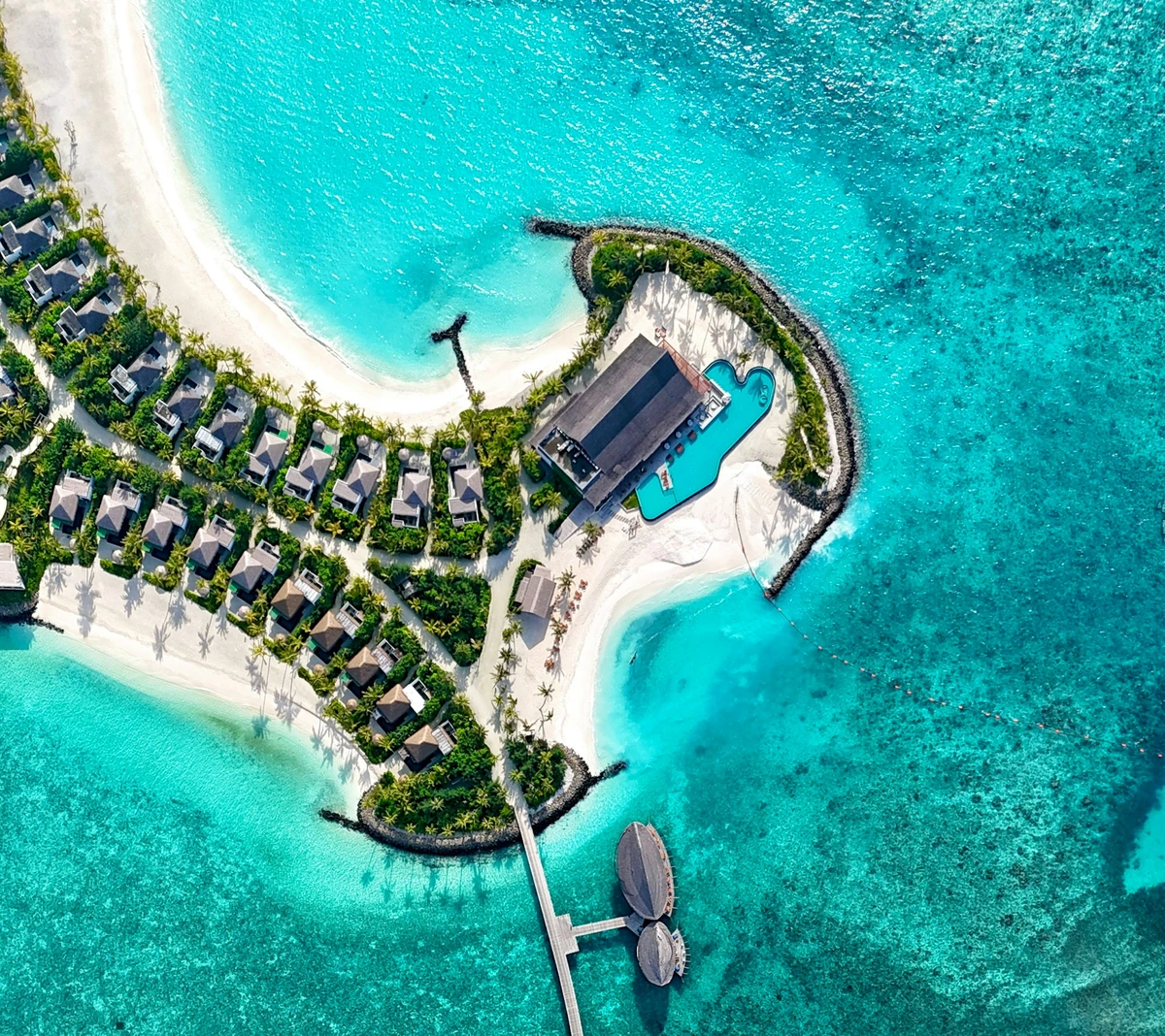 Aerial view of a private island resort in the Maldives